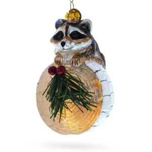 Shop All | Curious Raccoon On The Log - Blown Glass Christmas Ornament - CaringForTots - Professional Baby and Children's Products | Caring for Growth, Caring for Every Moment
