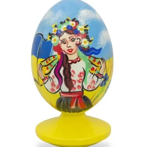 Ukrainian Girl With Flag Easter Egg Figurine - CaringForTots - Professional Baby and Children's Products | Caring for Growth, Caring for Every Moment* Ukraine