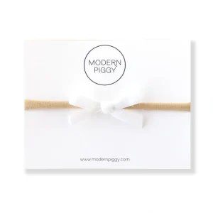 White | Mini Ribbon Bow - Nylon Headband - CaringForTots - Professional Baby and Children's Products | Caring for Growth, Caring for Every Moment* All Products