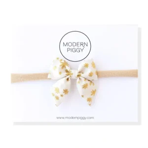White Christmas | Mini Piggy Bow - CaringForTots - Professional Baby and Children's Products | Caring for Growth, Caring for Every Moment* Piggy Bow